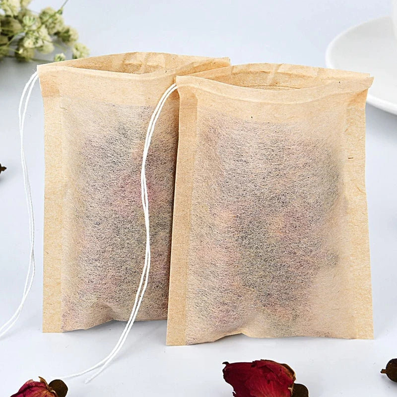 100Pcs Teabags Biodegradable Paper Tea Bag Drawstring Eco-Friendly Filter Empty Tea Bags Loose Leaf Tea Powder Herbal Medicine